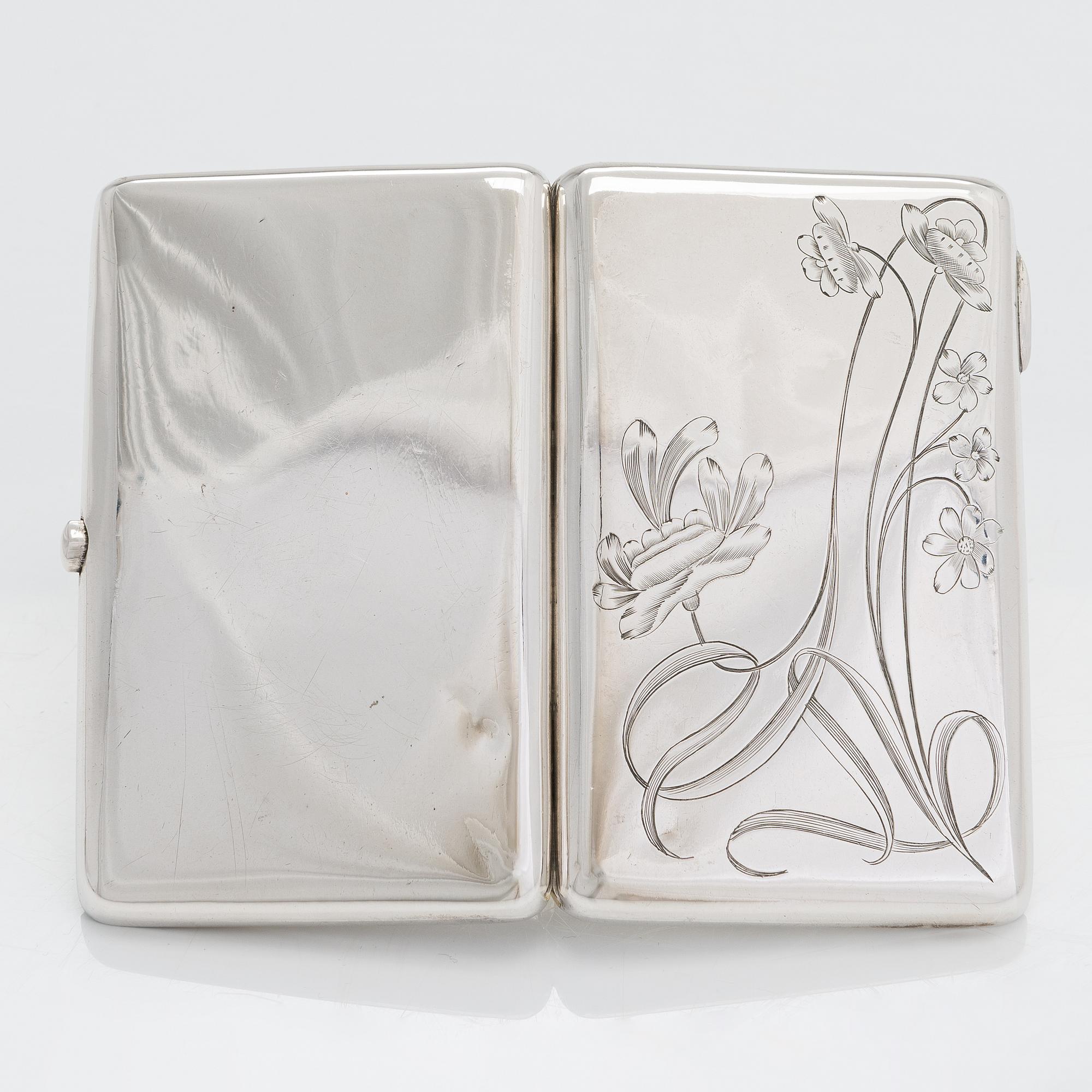 A silver cigarette case, maker's mark of Vasili Sikazev, Moscow 1908-17.