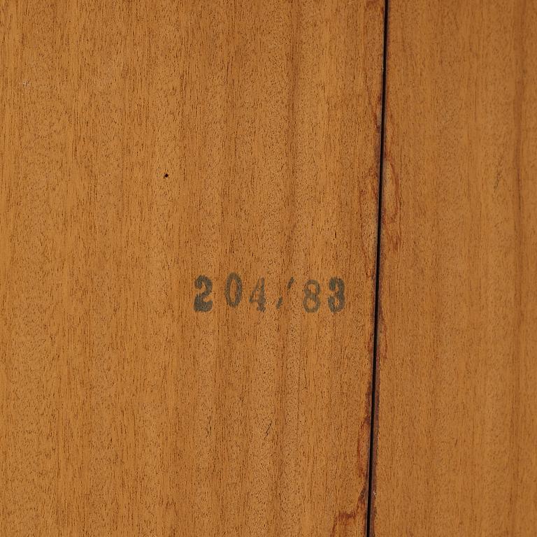 Niles Otto Møller, a rosewood veneered table with four chairs, JL Møller, Denmark, 1950's/60's.