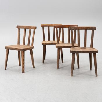 Axel Einar Hjorth, a set of four stained pine "Utö" chairs, Nordiska Kompaniet, Sweden, 1930s.