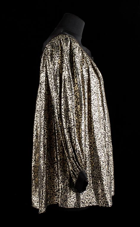 A georgette blouse by Yves Saint Laurent.