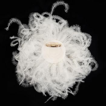 Chanel, a feather brooch.