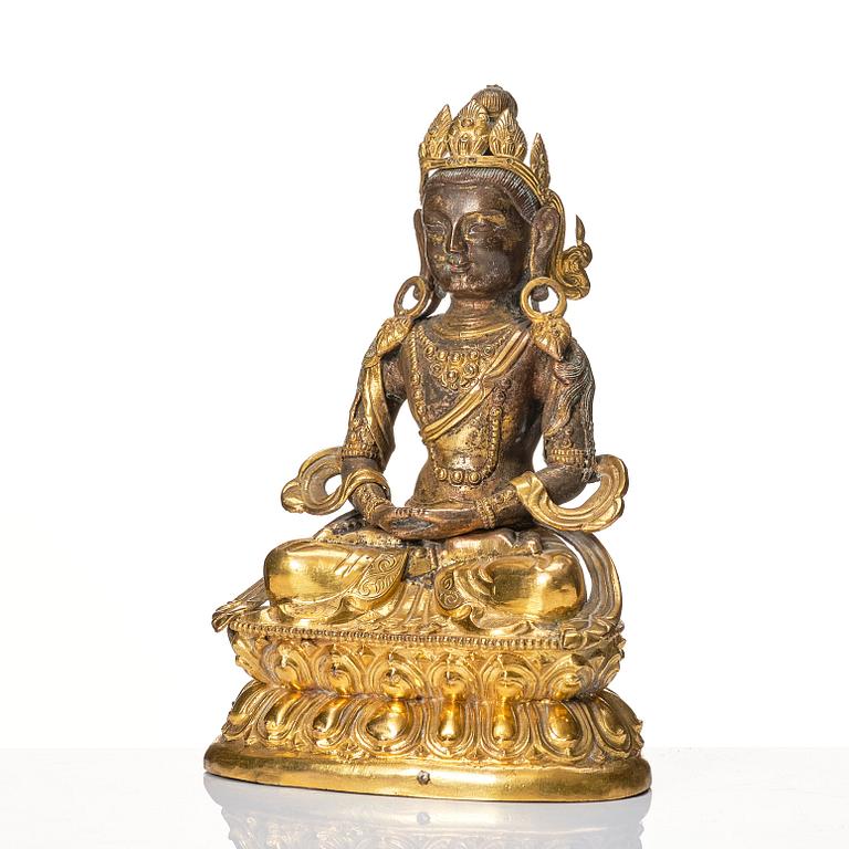 A Mongolian, partly gilt reoussé sculpture of Amitayus, 19th Century.