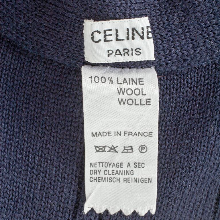 CÉLINE, a dark blue wool cardigan.