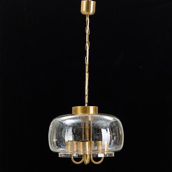 A 1960/70s glass and brass ceiling lamp.