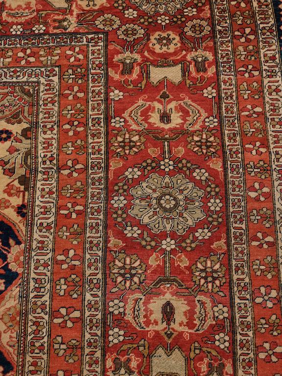 A CARPET, an antique/semi-antique Kashan so called Motachem, ca 333,5-354 x 218-243 cm.