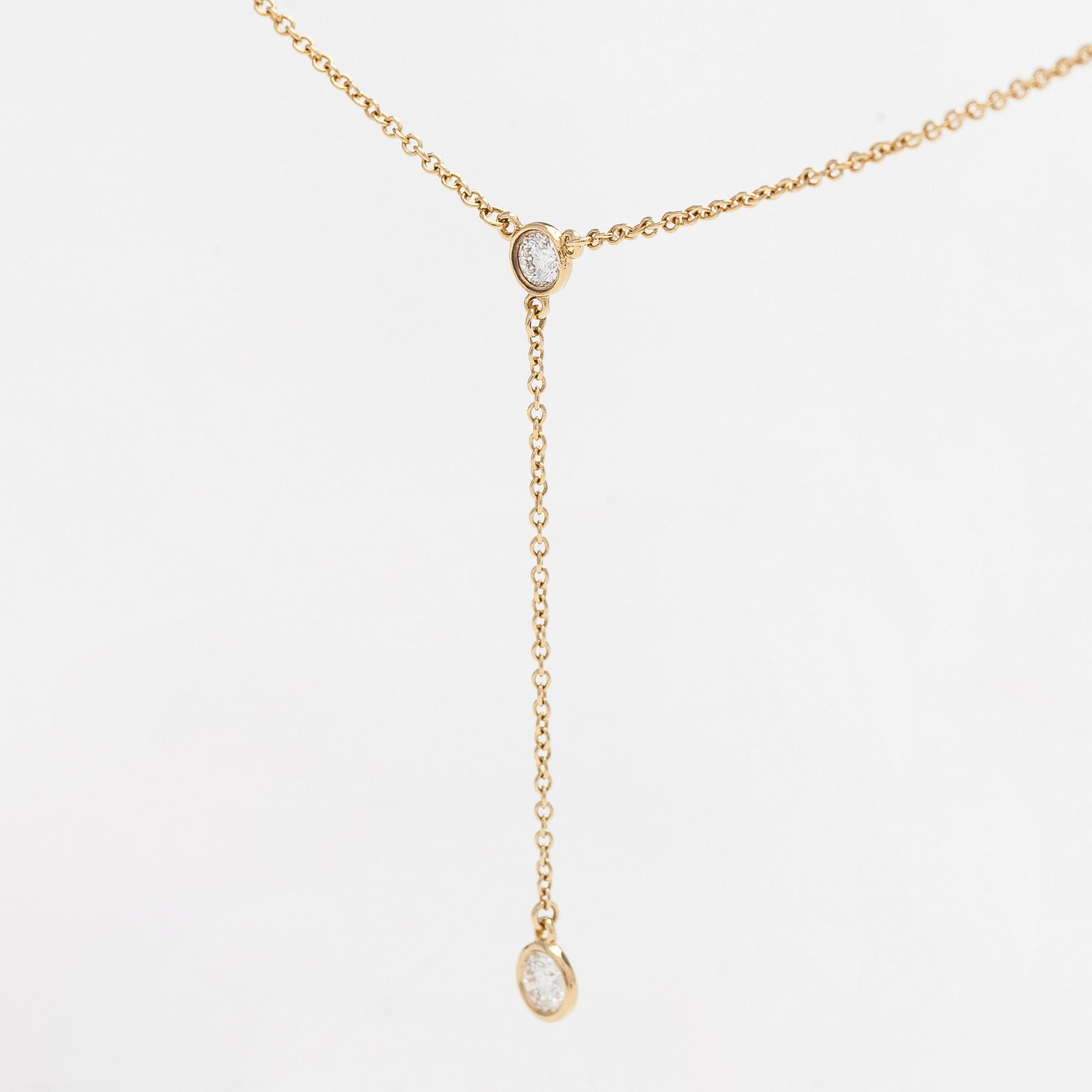 Tiffany & Co, Elsa Peretti, kaulakoru, "Diamonds by the Yard", 18K kultaa ja kaksi briljanttihiottua timanttia.