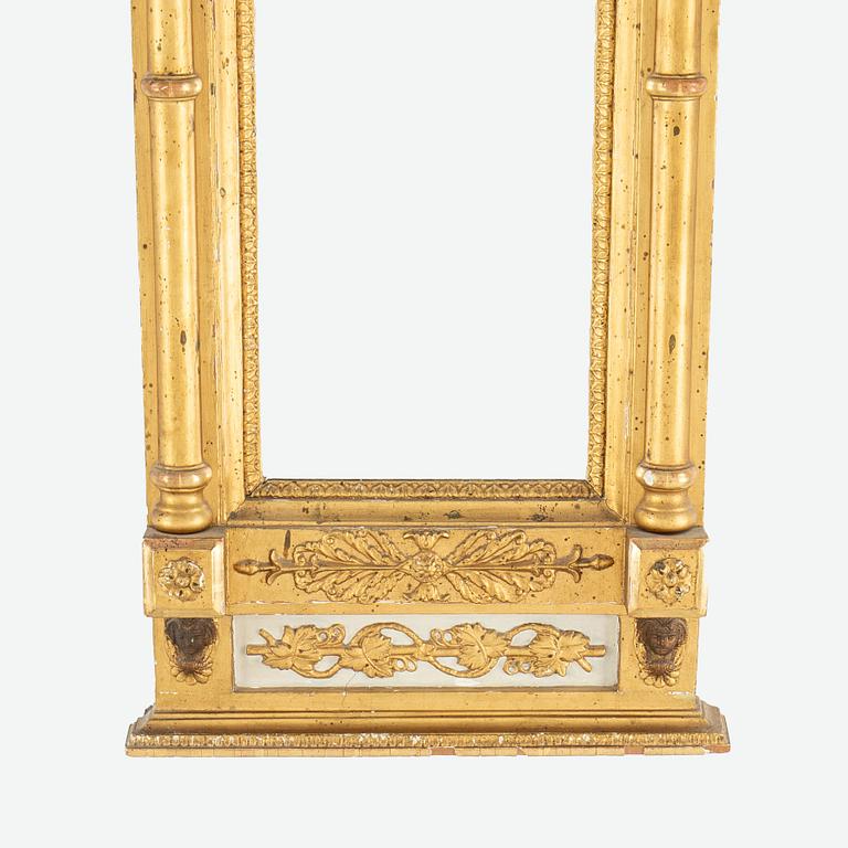 A lat Gustavian mirror from around  the year 1800.