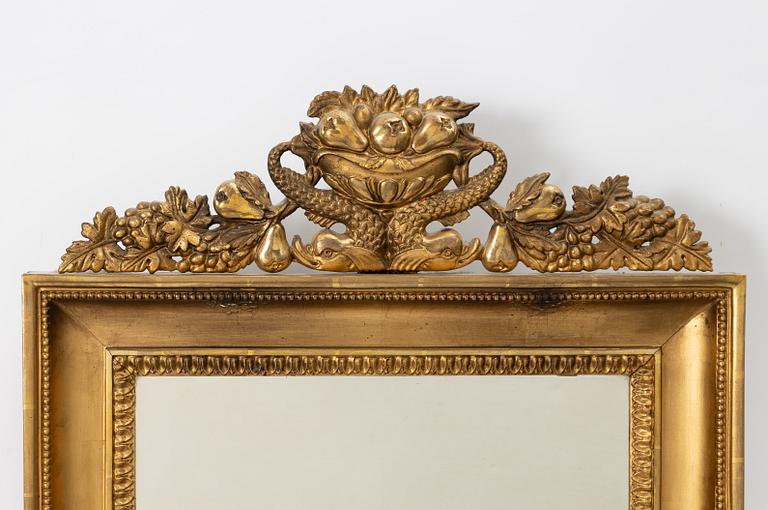 A pair of Empire giltwood two-branch girandole mirrors, Sweden, first part 19th century.