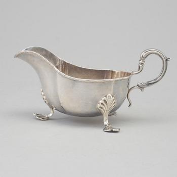 A silver cream jug, maker's mark Williams ( Birmingham) Ltd, Birmingham, 1924.