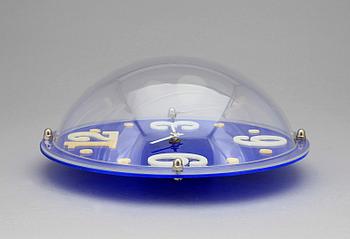 VÄGGUR, plexiglas, "Saturnus" design Ulf Velander.