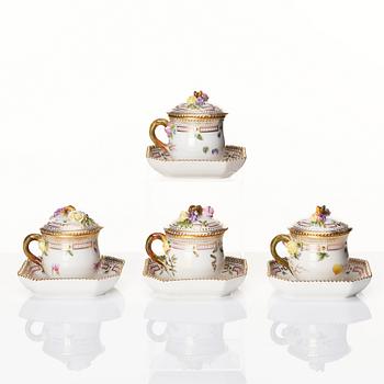 A set of four Royal Copenhagen 'Flora Danica' custard cups with stands, Denmark, 20th Century.