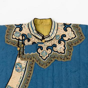 An embroidered and winter padded Chinese silk jacket, Qing dynasty, 19th century.