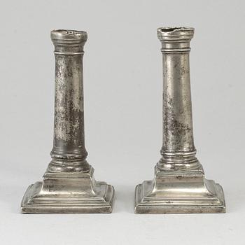 A pair of 18th century pewter candlesticks, London.