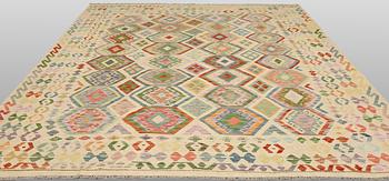 A Kilim carpet, 288 x 250 cm.