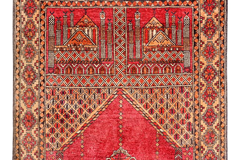 A silk Beluch rug, c. 124 x 81 cm.