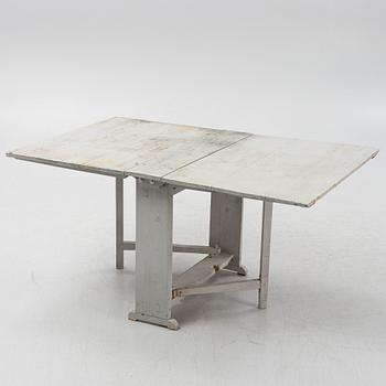A 19th century gate-leg table.