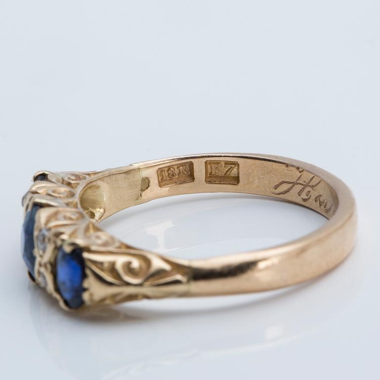 A sapphire and old-cut diamond ring, 1908.