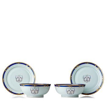 993. A pair of large famille rose punch bowls with stands, Qing dynasty, 18th Century.