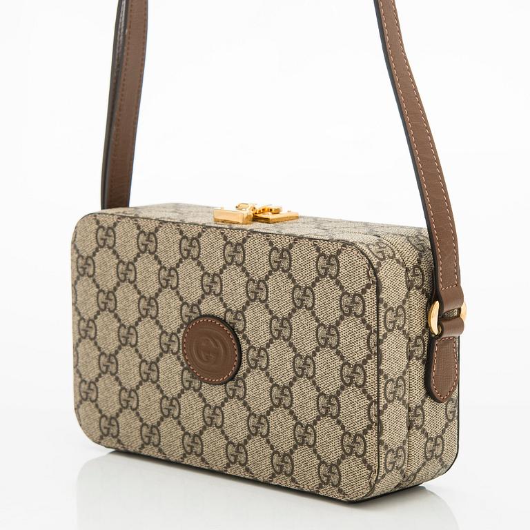Gucci, "GG Supreme" laukku.