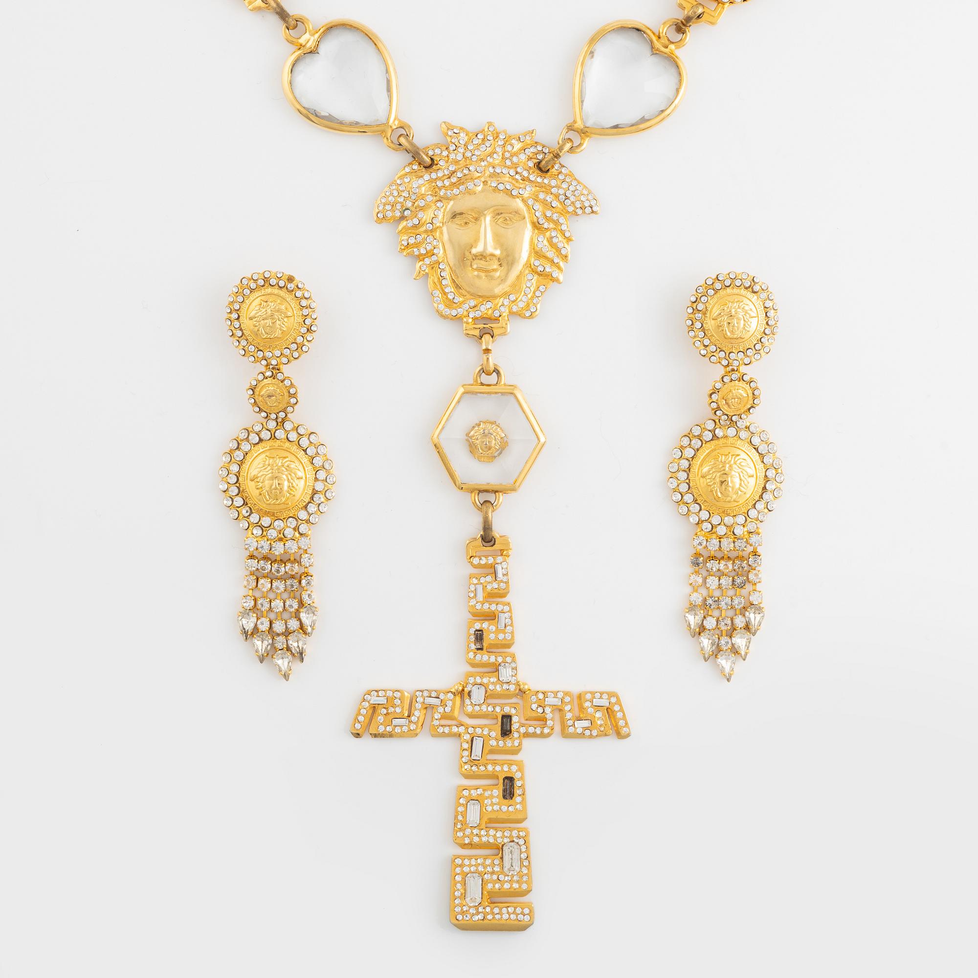 A Versace demi-parure comprising a necklace and a pair of earrings.