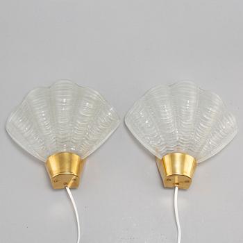 A pair of ASEA shell shaped glass wall lamps, 1940's.