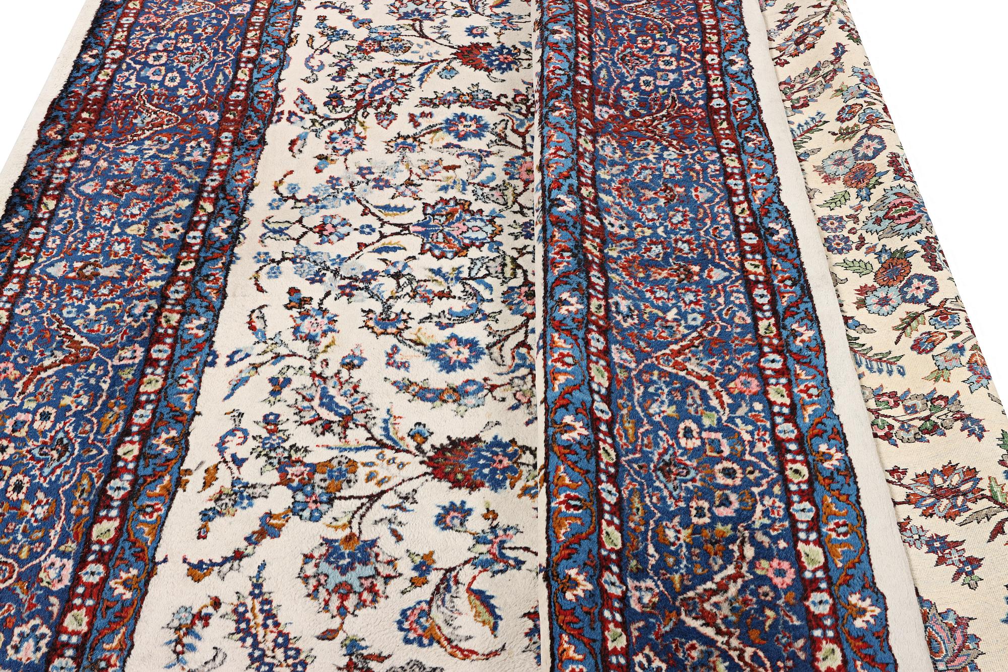 An oriental carpet, c. 308 x 220 cm.