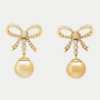A pair of 18K gold earrings set with round brilliant-cut diamonds and cultured pearls.