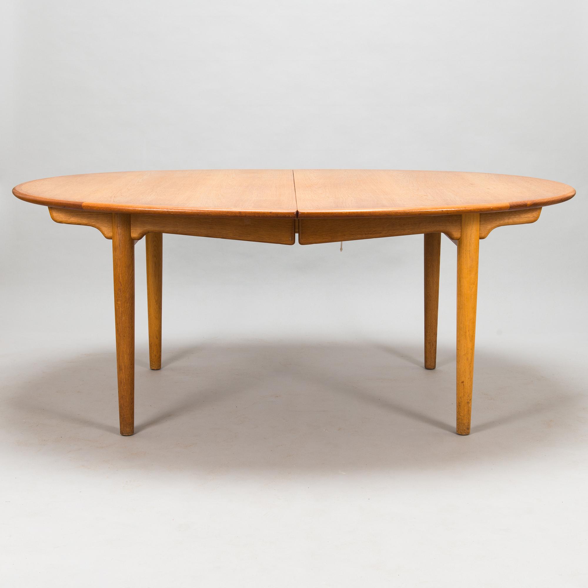 Hans J Wegner, A 1950s dining table model JH 567, Johannes Hansen, Denmark.