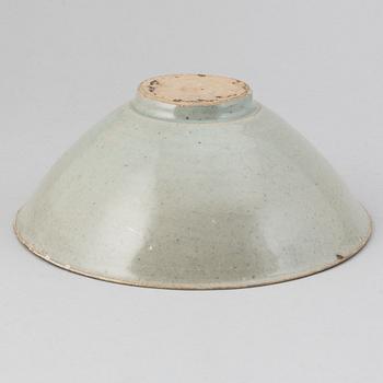 A Sawankhalok jar with cover and a pale celadon glazed bowl for the South East Asian market.