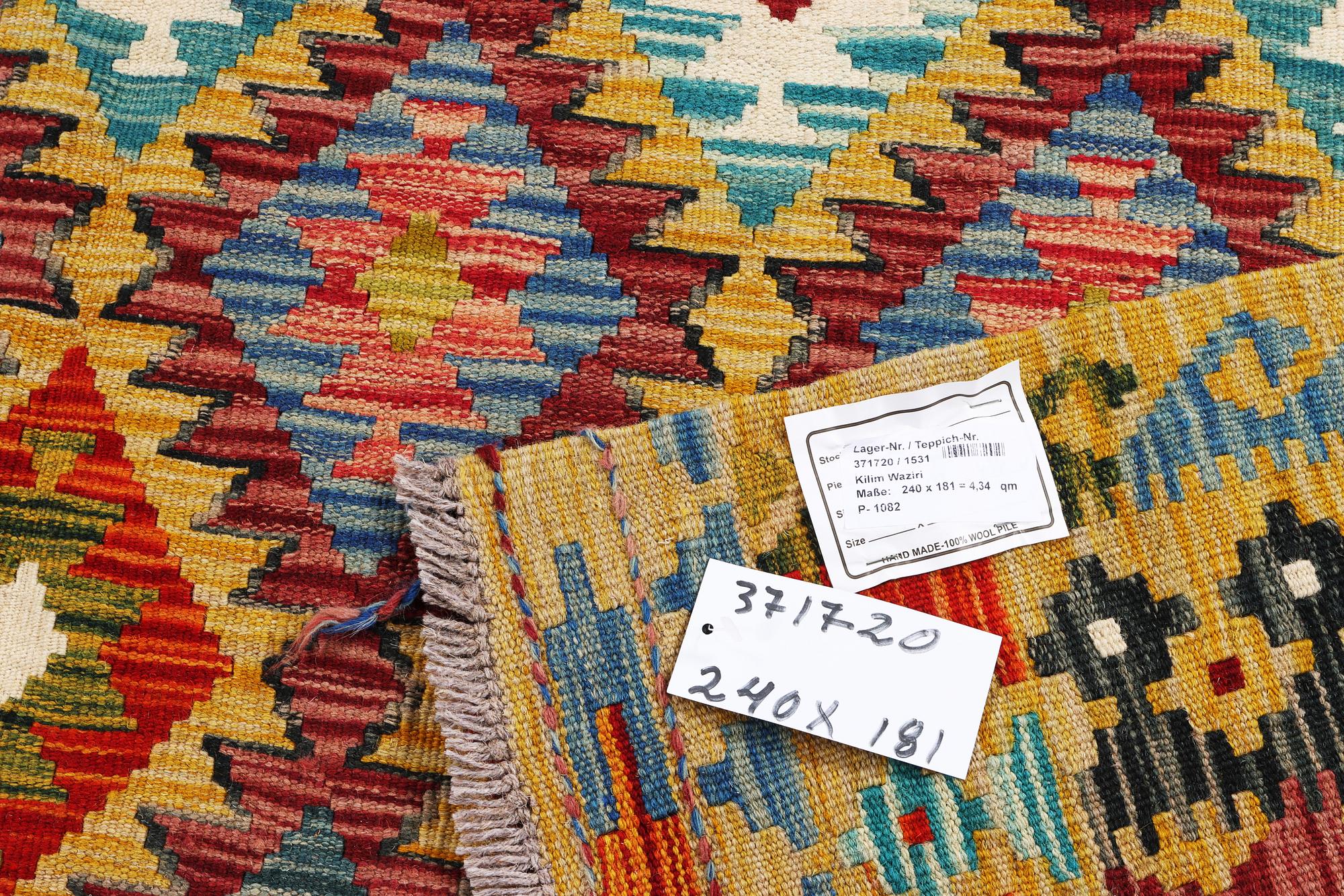 A Kilim carpet, c. 240 x 181 cm.