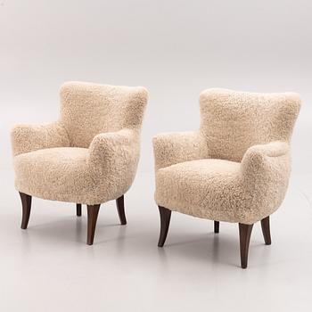 A pair of Swedish Modern armchairs, mid 20th century.