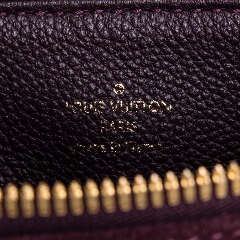 Louis Vuitton, a Monogram Empreinte 'Audacieuse' bag.