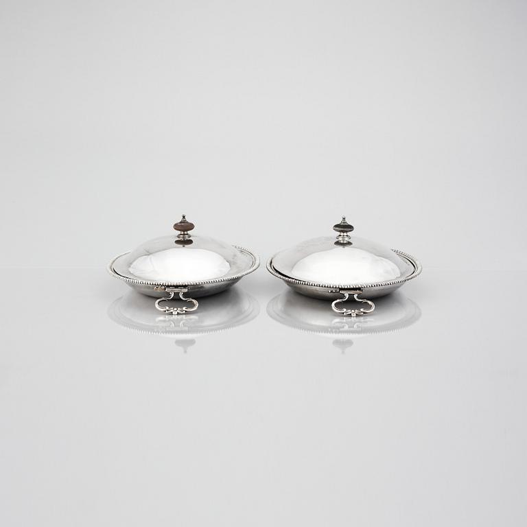 A pair of 18th Century dishes and cover, mark of Andrew Fogelberg, London 1772.