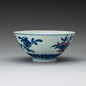 A blue, white and red bowl, late Qing dynasty with Qianlong seal mark.