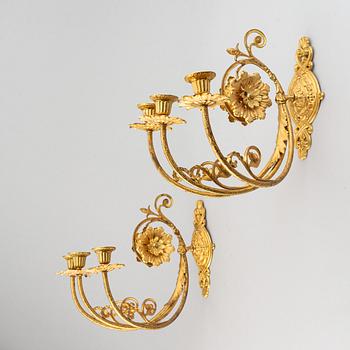 A pair of wall sconces from the late 19th century.