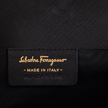 Salvatore Ferragamo, a black saffiano leather crossbody bag.
