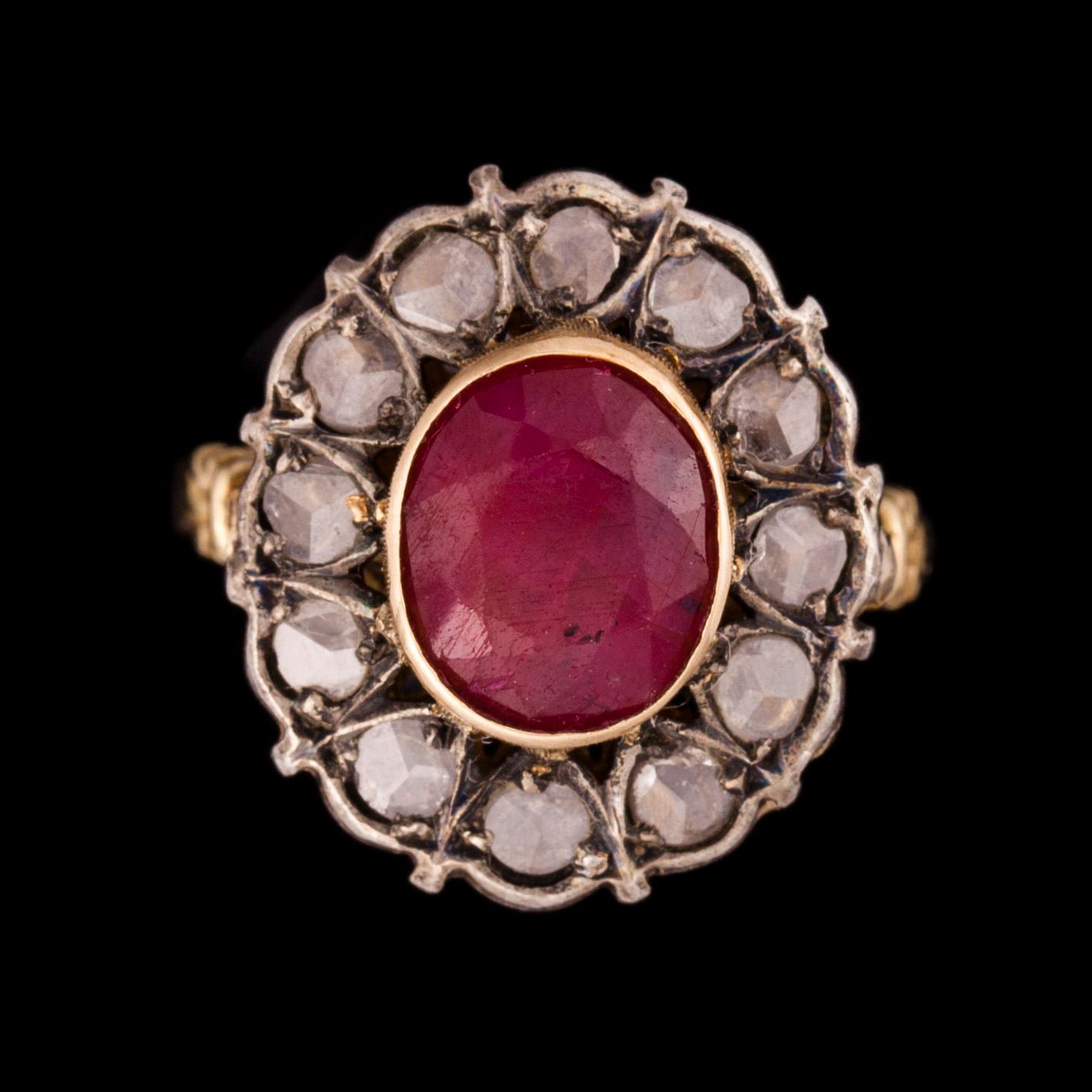 ARMSMYCKE samt RING, förgyllt silver, rubiner och polki diamanter. Vikt tot. 45 g.