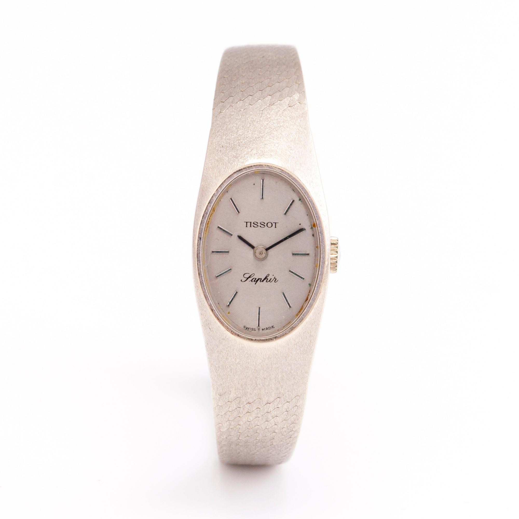 TISSOT SAPHIR 14K white gold, wrist watch. width 16.6 mm.