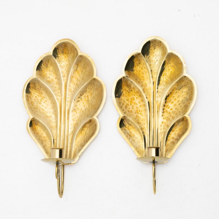 Lars Holmström, a pair of brass sconces, Swedn, first half of the/mid20th century.