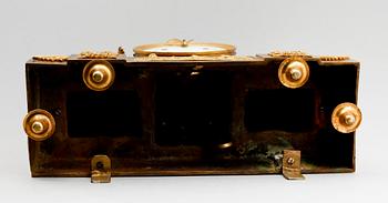 A French Empire early 19th century gilt bronze mantel clock.