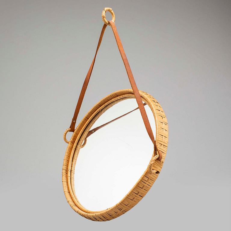 A 1960s rattan frame mirror , possibly Ikea.