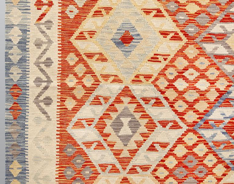 A Kilim carpet, ca 290 x 215 cm.