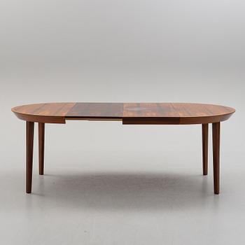 A 1950s/1960s rosewood veneer table.