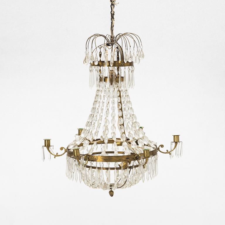 An Empire-style six-light chandelier, circa 1900.