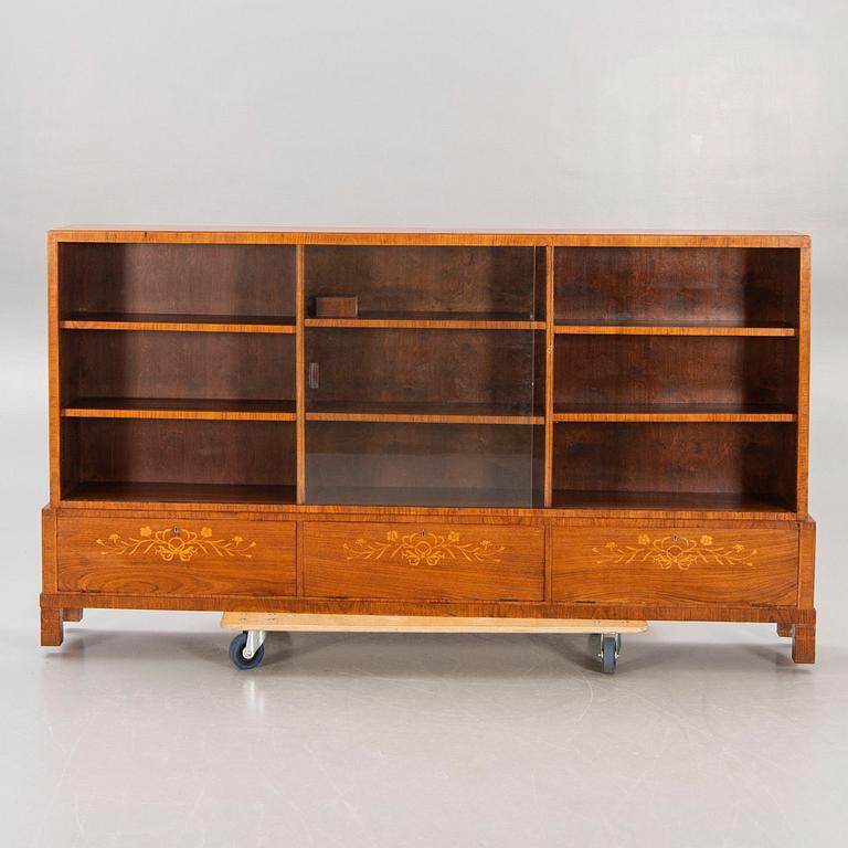 A Swedish Modern 1940s mahogany book cupboard.