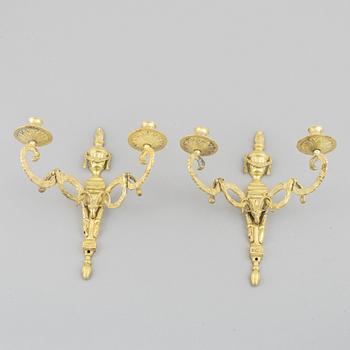 A pair of early 20th century Louis XVI-style wall sconces.