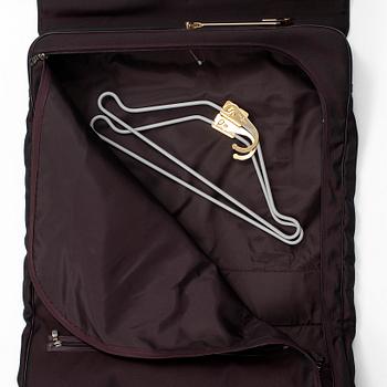 LOUIS VUITTON, a 'Gibeciere' garment cover.