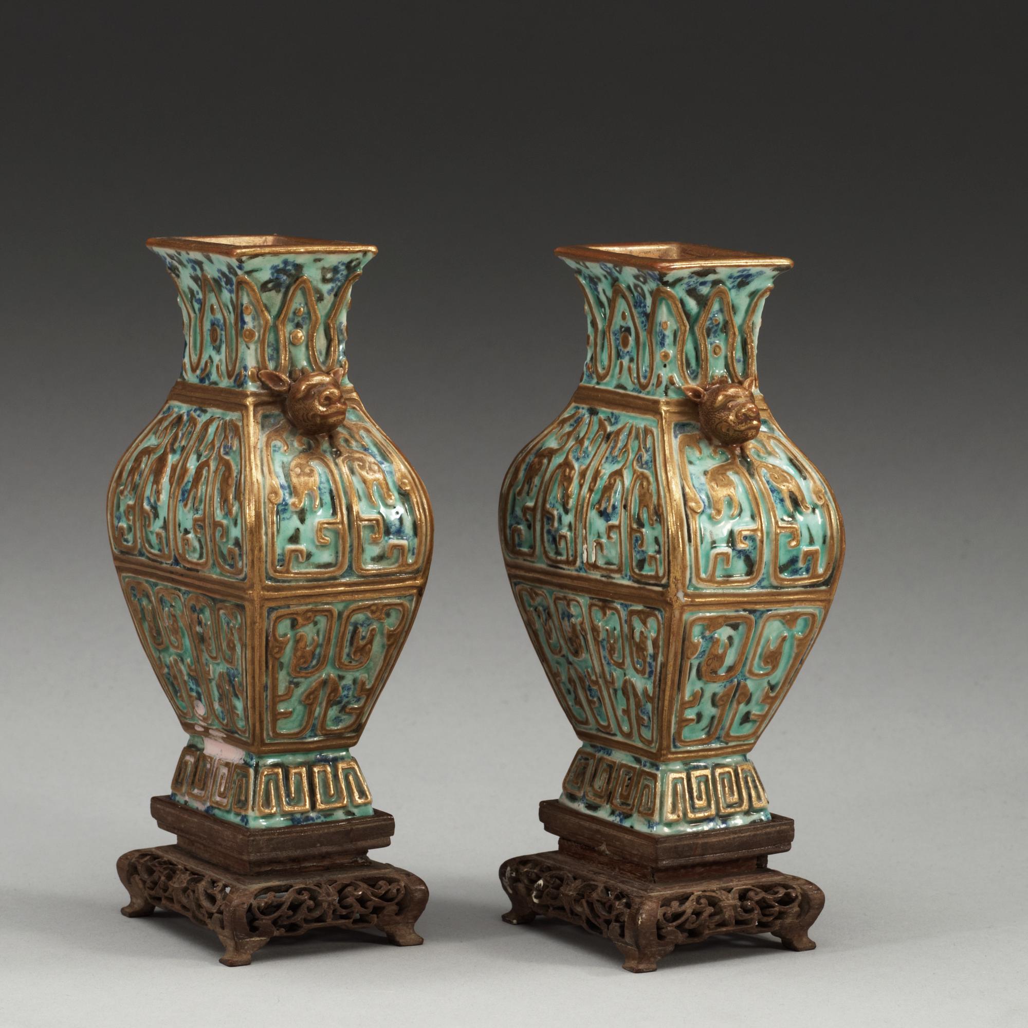 A pair of vases, late Qing dynasty, with Qianlong sealmark.
