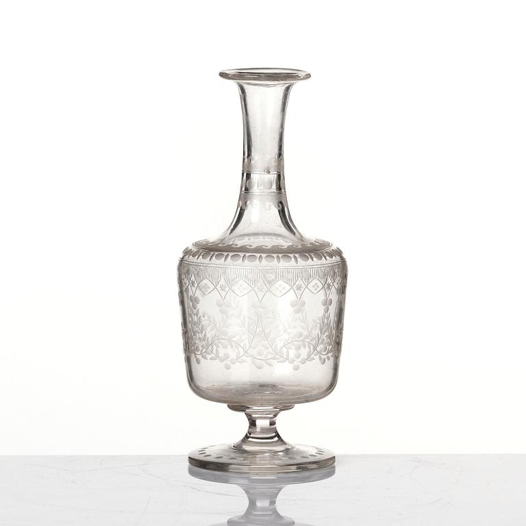 An engraved flask, circa 1800.