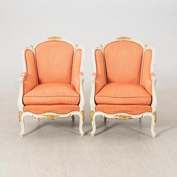 Bergèrer/fåtöljer ett par Rokoko-stil 1900-talets första hälft.